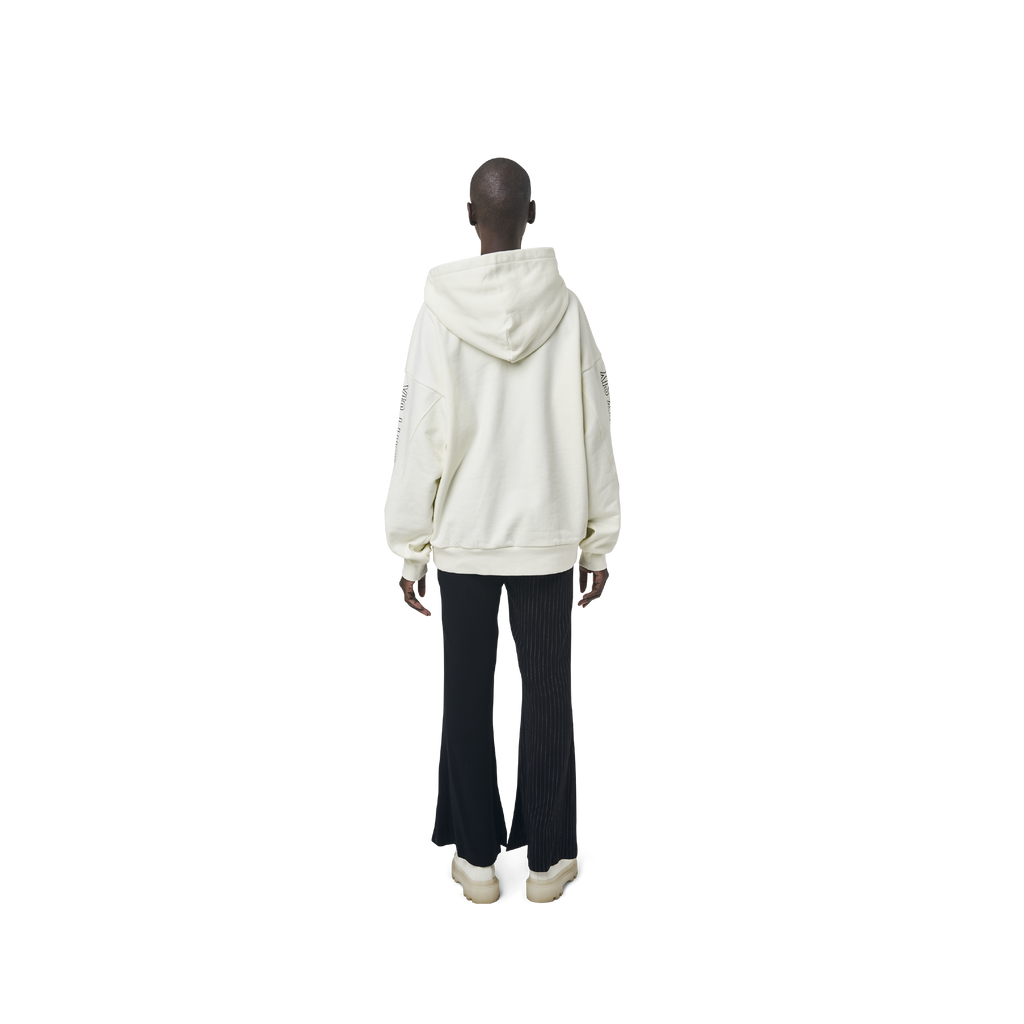 Long sleeves oversize cut hoodie in washed off white color fabric featuring 1886 print at sleeves. 1886 logo embroidered at kangaroo pocket. A button on the hood. Rib knit at cuffs and hem.